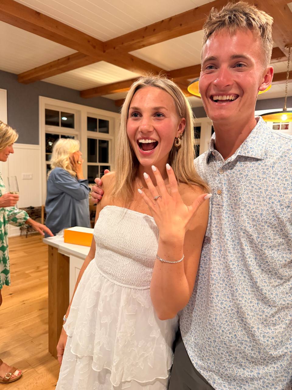 Syd and Tucker celebrating their engagement